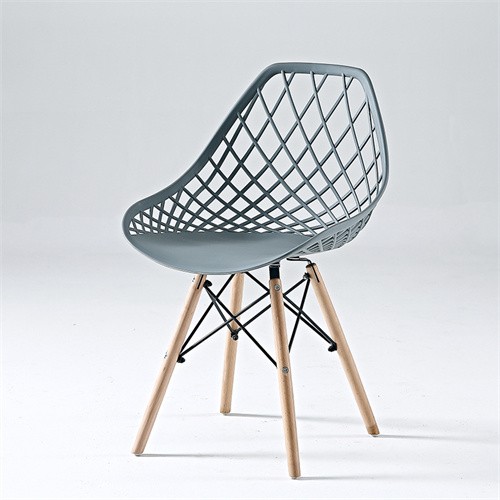 Hollow out plastic chair with eiffel wood feet